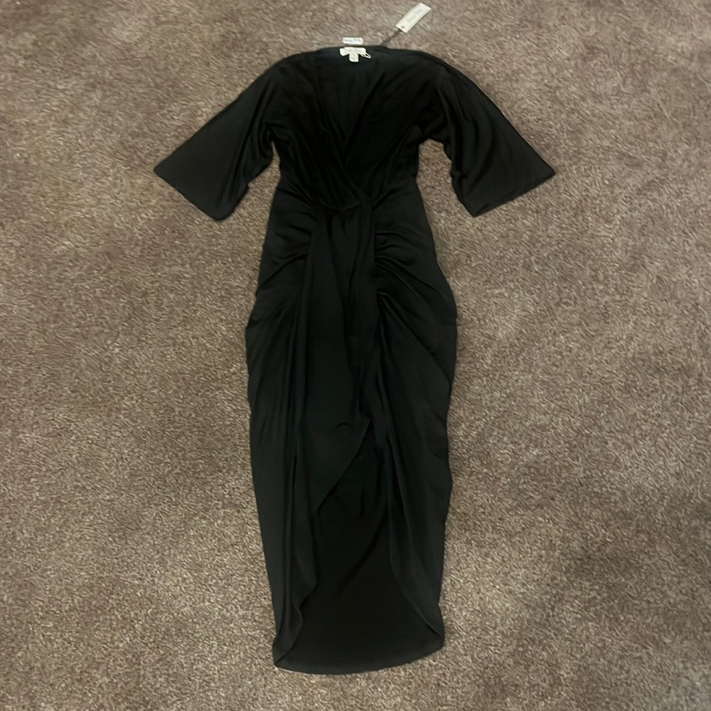 New with a tag! Beautiful black dress. Size small